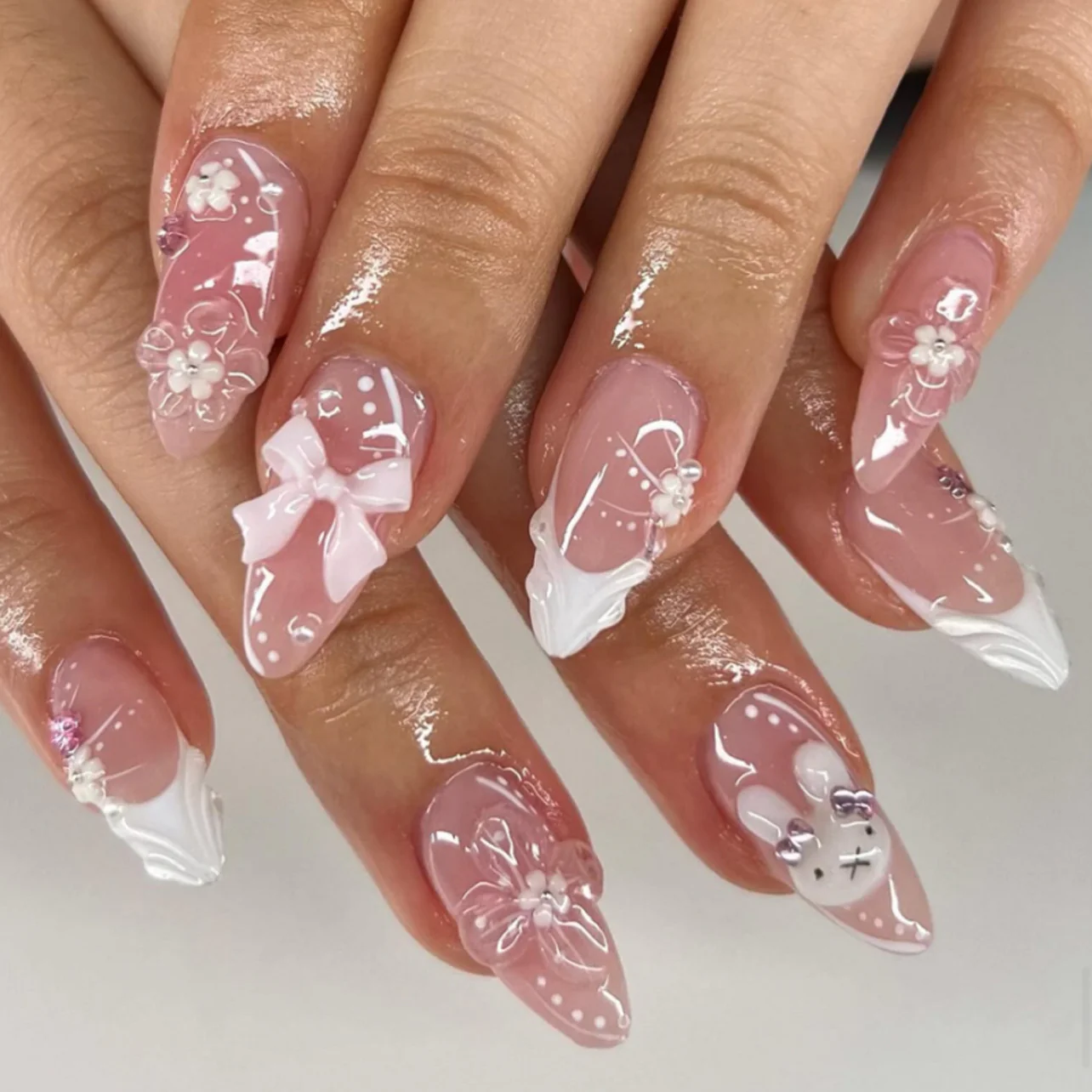 Elegant 3D nail design with embellishments